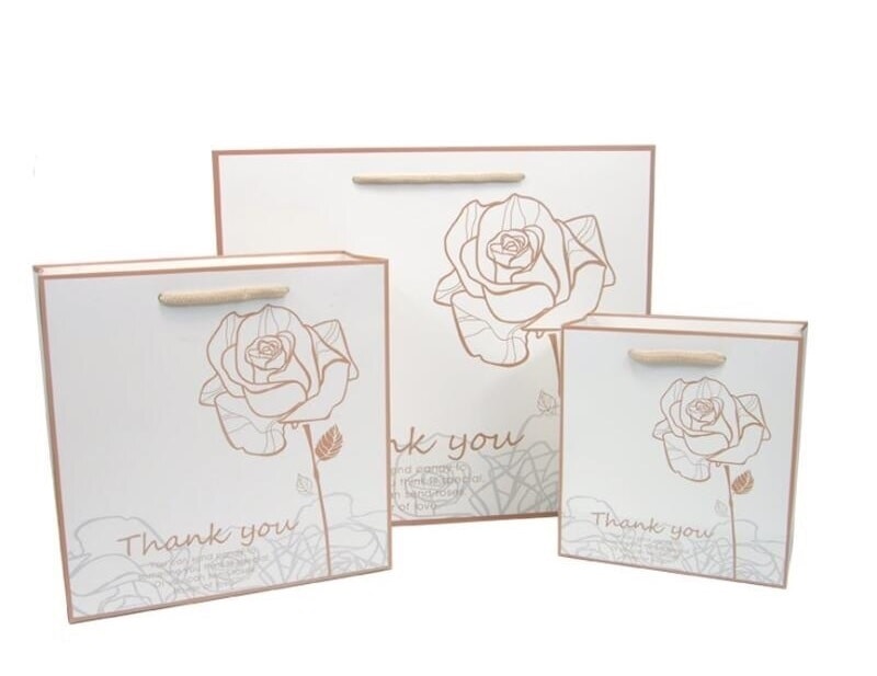 Sử dụng lời cảm ơn và họa tiết bông hồng để trân trọng khách hàng đã lựa chọn sản phẩm tui-giay-dung-my-pham